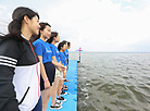 Japanese schoolgirls at Lake Naroch