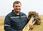 Oleg Bondarevich, the first harvester driver to pass the mark of 2,000 tonnes of grain in Grodno Oblast