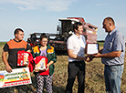 Maksim and Anna Yatsukhno, the best young harvesting crew in Yelsk District