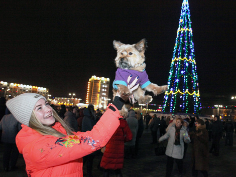 Veronika Komleva with her dog Dorik, the symbol of 2018 
