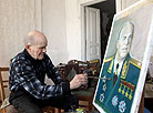 92-year-old war veteran Vasily Gordeenko paints a portrait of the Marshal Zhukov