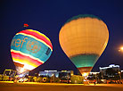 Night glow of hot air balloons

