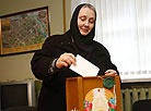 Nuns and novices of the Grodno convent of the Saint Nativity of the Blessed Virgin take part in the voting process