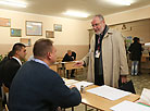 OSCE/ODIHR mission head Jacques Faure at polling stations at Minsk school No. 101