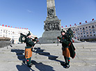 British pipers perform in Victory Square in Minsk