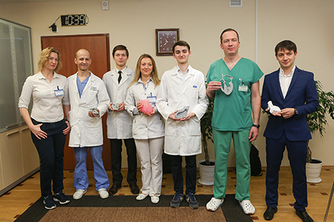 Heart surgeons and designers of the 3D printed heart model 