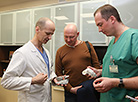 Heart surgeon Vladimir Andrushchuk, patient Leonid Vokhmin and heart surgeon Vitaly Odintsov