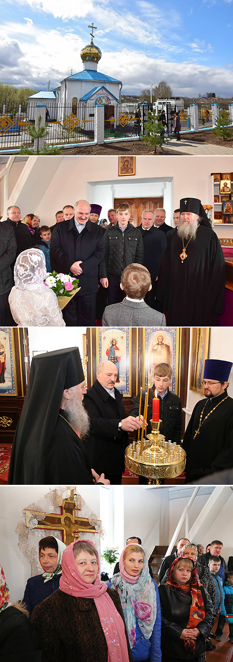Alexander Lukashenko lights the candle in the Holy Transfiguration Church on Easter 