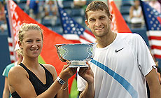 Belarus' tennis players Max Mirnyi and Victoria Azarenka at the Olympic Games in London in 2012