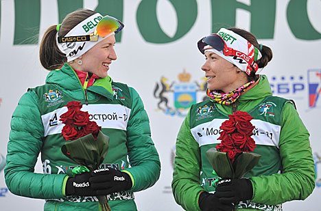 Darya Domracheva and Nadezhda Skardino of Belarus on the podium