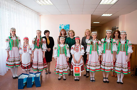 Lukashenko awards director of Belarusian school in Riga