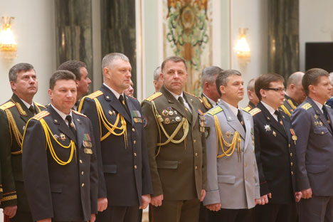 At a ceremony to present shoulder straps to senior officers