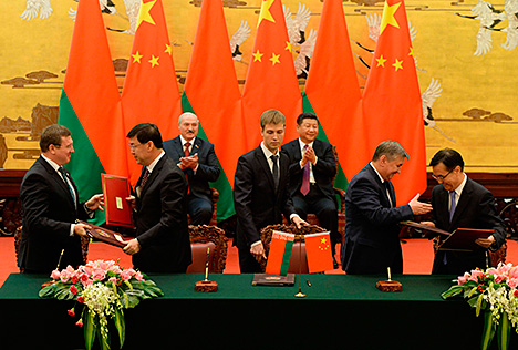 Belarusian and Chinese officials signed about 30 agreements and memorandums on the development of cooperation in various fields, including the manufacturing sector and investments, finance, trade, education, and tourism