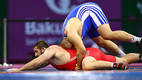 Іосіф Чугашвілі ў паядынку з грузінскім атлетам Якобі Каджая