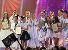 Winner Helena Meraai and show hosts Olga Ryzhikova and Teo