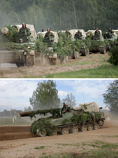 A column of self-propelled howitzers Giatsint of the Belarusian army on the march in an exercise area