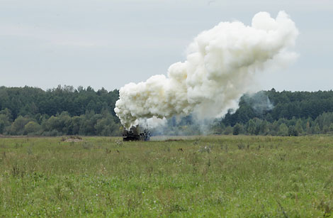 Troops mark the front line of defense with smokescreen