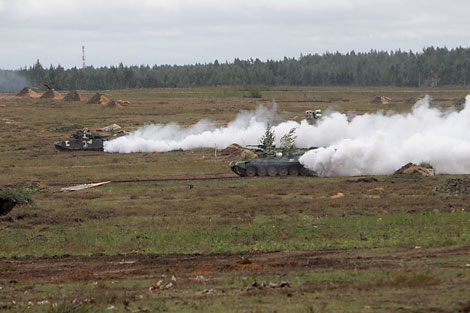 Troops mark the front line of defense with smokescreen