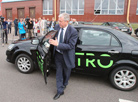 Deputy prime minister of Belarus Vladimir Semashko tests the first Belarusian electric car