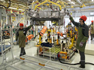 President Alexander Lukashenko takes part in the official inauguration of the new BelGee car factory