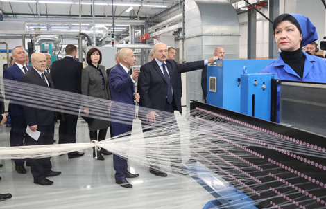 Belarus President Alexander Lukashenko on a tour of OAO Kamvol