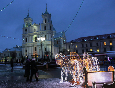 Catholic scouts bring the Bethlehem light to the Cathedral of St. Francis Xavier in Grodno