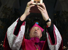 Bishop of the Grodno Catholic Diocese Aleksander Kaszkiewicz receives the Bethlehem light