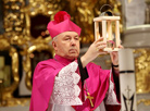 Bishop of the Grodno Catholic Diocese Aleksander Kaszkiewicz receives the Bethlehem light