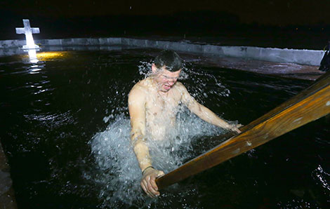 Belarusian Orthodox believers take ice plunges for Epiphany