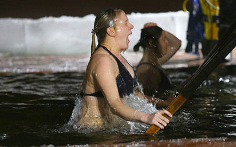 Belarusian Orthodox believers take ice plunges for Epiphany