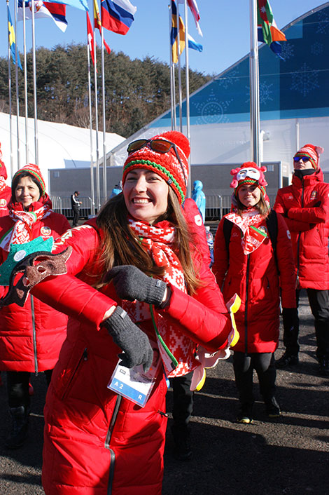 Belarusian biathlete Darya Domracheva at ceremony of hoisting up Belarus’ national flag at the Olympic Village 