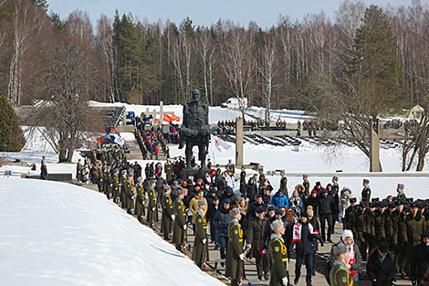 Flower ceremony at the Eternal Flame  in Khatyn Memorial