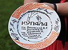 Production director Vladimir Yankovsky smashes a symbolic plate to kick off the biopic filming