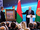 Painting of cosmonaut Alexey Leonov presented to Belarus president