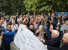 Participants of the congress open a memorial 