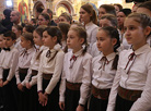 Belarus President Alexander Lukashenko lights a Christmas candle