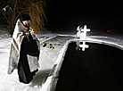 Belarusian dive into ice waters to celebrate Epiphany