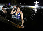 Belarusian dive into ice waters to celebrate Epiphany