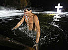 Belarusian dive into ice waters to celebrate Epiphany