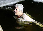 Belarusian dive into ice waters to celebrate Epiphany