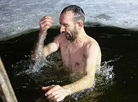 Belarusian dive into ice waters to celebrate Epiphany