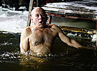 Belarusian dive into ice waters to celebrate Epiphany