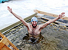 Belarusian dive into ice waters to celebrate Epiphany