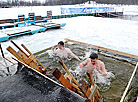 Belarusian dive into ice waters to celebrate Epiphany