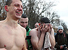 Belarusian dive into ice waters to celebrate Epiphany