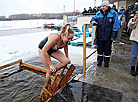 Belarusian dive into ice waters to celebrate Epiphany