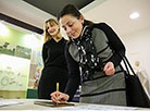 Workshop on writing ancient Cyrillic letters on a tablet with cera (wax tablet)