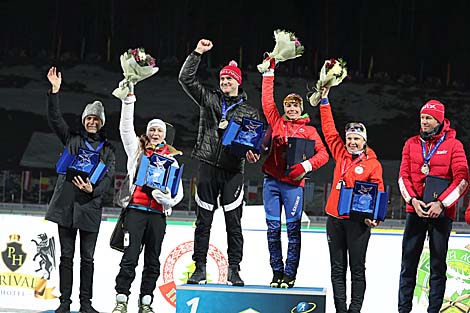 Mixed Relay podium: Nadezhda Skardino and Sergei Novikov, Darya Domracheva and Ole Einar Bjoerndalen, Anna Bogaliy and Frode Andresen
