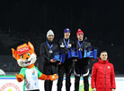 NOC First Vice President Andrei Astashevich presents awards to Men Mass Start medals to Andriy Deryzemlya (Ukraine),  Ole Einar Bjoerndalen (Norway), Sergei Novikov (Belarus)