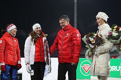 Nadezhda Skardino, Darya Domracheva and Belarusian Sport and Tourism Minister Sergei Kovalchuk